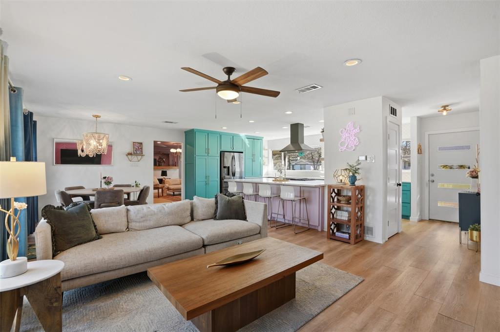 1008 Ridgewood Terrace Arlington, TX 76012 - Photo 10 of 40 a living room with furniture and a kitchen view