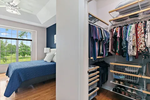 a view of a bedroom with furniture and staircase