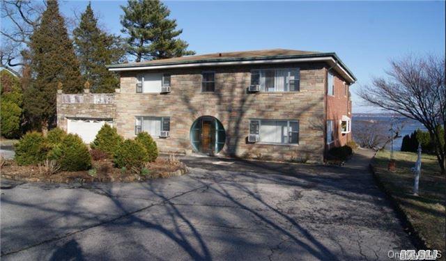 30 Shore Road Pelham, NY 10803 - Photo 1 of 1 a view of a house with a yard
