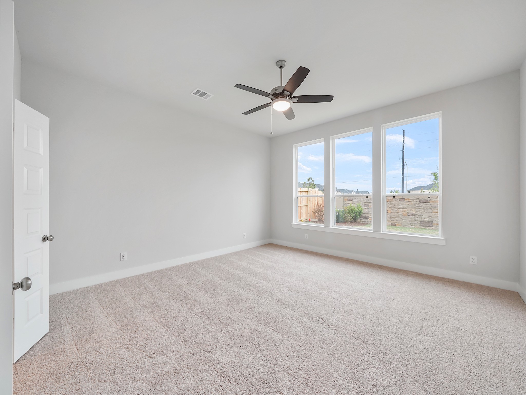 6010 Rolling Strm Court Fulshear, TX 77441 - Photo 8 of 23 Escape to your spacious primary retreat, designed for ultimate comfort and relaxation. Imagine a king-size bed, an opulent ensuite bathroom, and a generous walk-in closet – all waiting to envelop you in luxury.