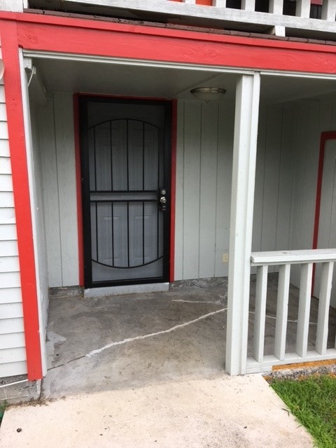 17-304 Volcano Road Kurtistown, HI 96749 - Photo 12 of 13 a house with red door