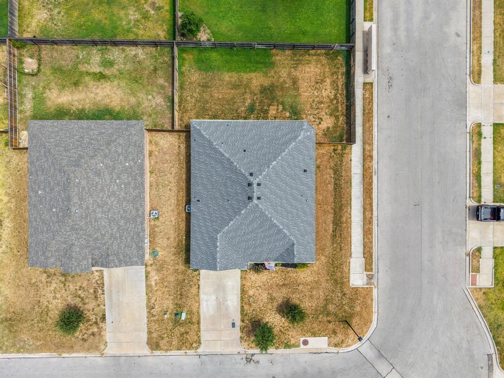 11101 Beckon Waco, TX 76708 - Photo 2 of 35 Gabled roofline, concrete driveway, concrete sidewalk, fenced backyard, street access