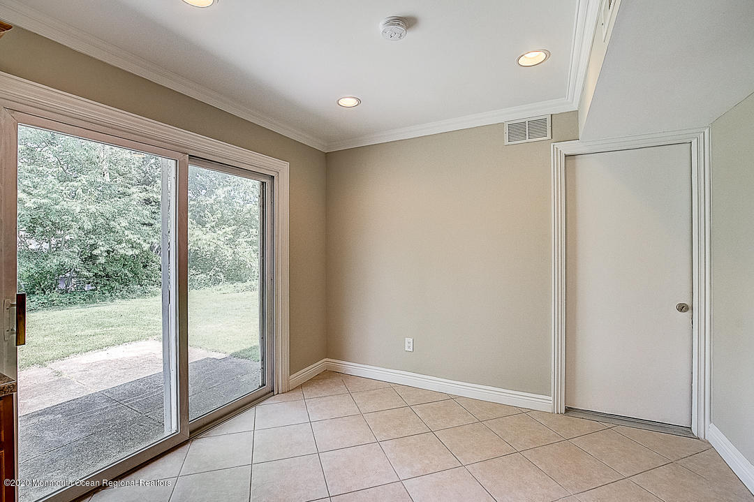 257 Lloyd Road Aberdeen, NJ 07747 - Photo 14 of 46 a view of an empty room and window