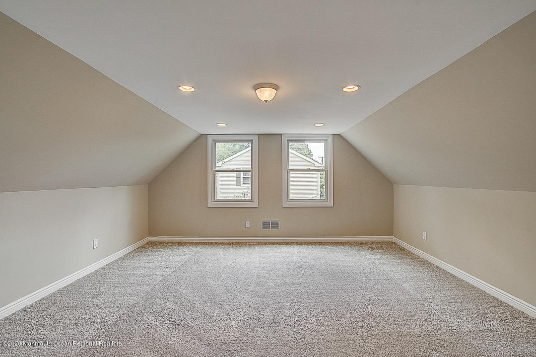 257 Lloyd Road Aberdeen, NJ 07747 - Photo 36 of 46 a view of an empty room with a window