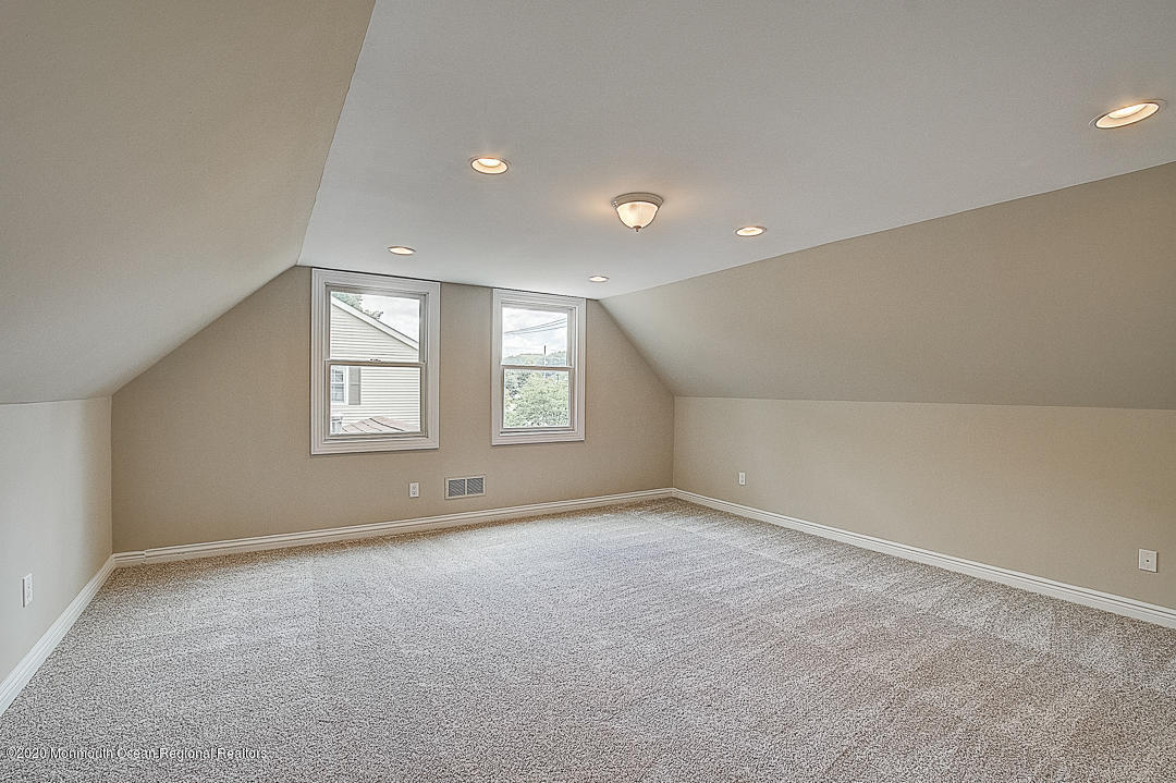 257 Lloyd Road Aberdeen, NJ 07747 - Photo 37 of 46 an empty room with windows