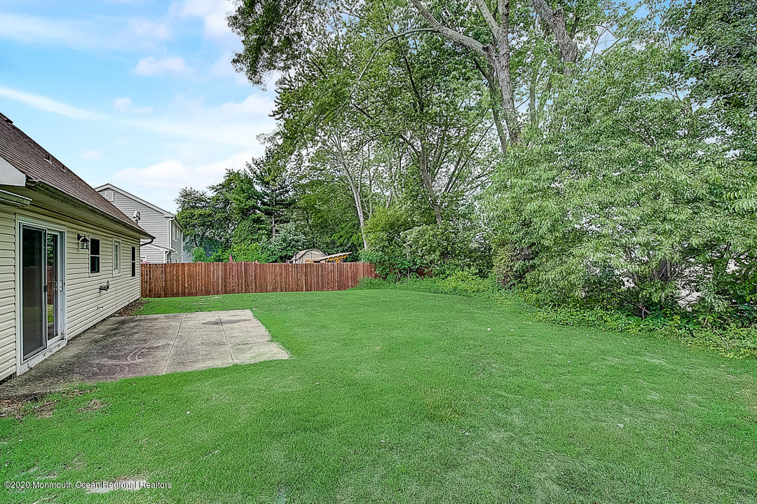 257 Lloyd Road Aberdeen, NJ 07747 - Photo 41 of 46 a view of a back yard of the house