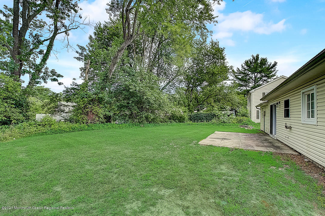 257 Lloyd Road Aberdeen, NJ 07747 - Photo 46 of 46 a view of backyard with green space
