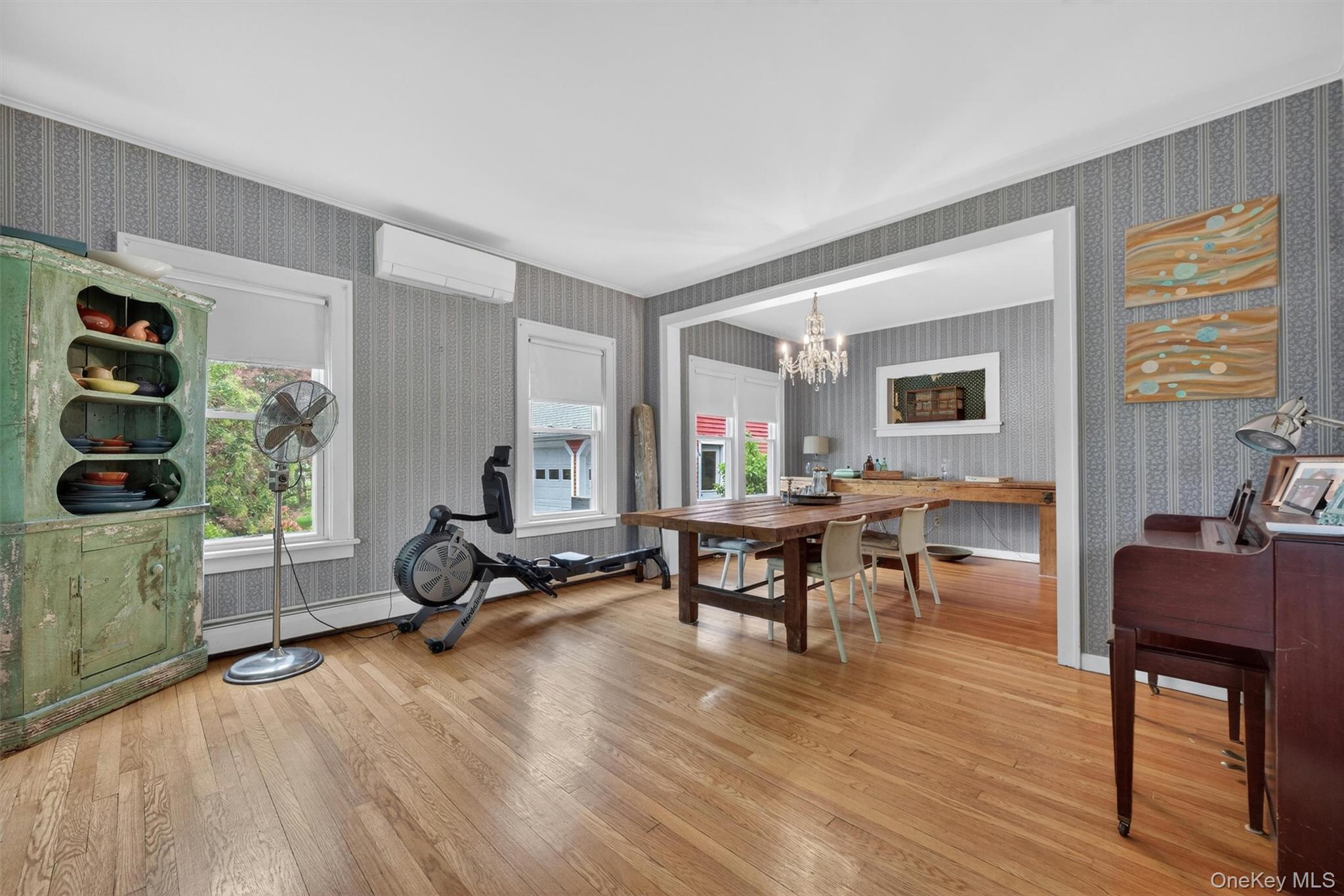 10 Edwin Road Poughkeepsie, NY 12603 - Photo 7 of 46 a living room with furniture a window and gym equipment