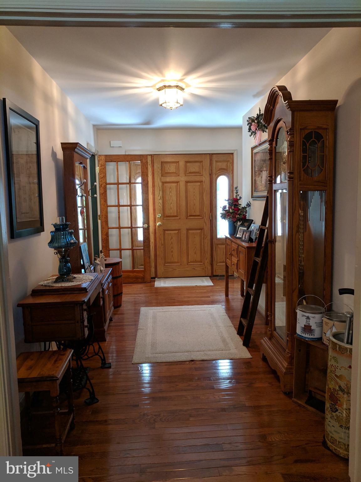 7708 Levin Dashiell Road Hebron, MD 21830 - Photo 19 of 95 Foyer wi/wood floors