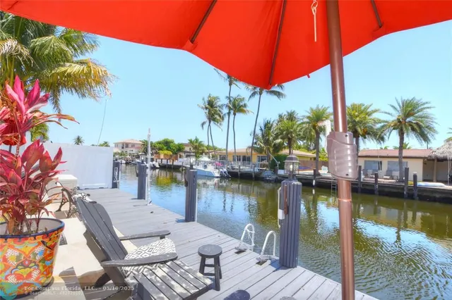 a view of a lake with sitting area