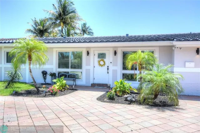 a front view of a house having patio