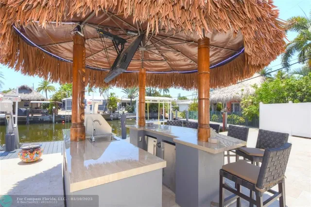 a view of a patio with swimming pool