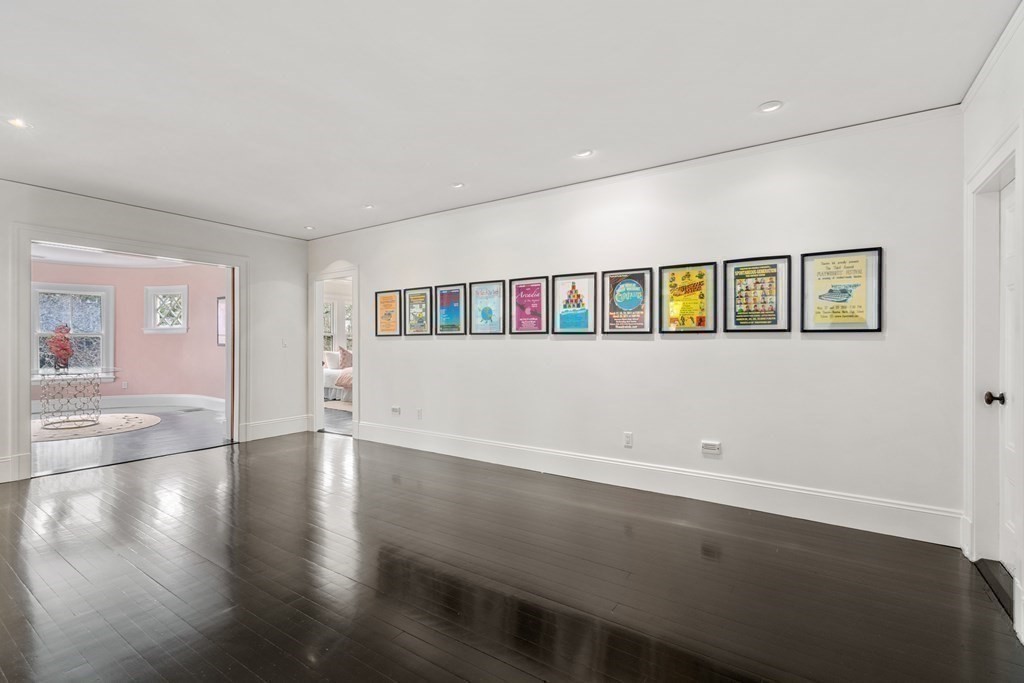 85 Prince Street Newton, MA 02465 - Photo 12 of 37 wooden floor in an empty room with a window