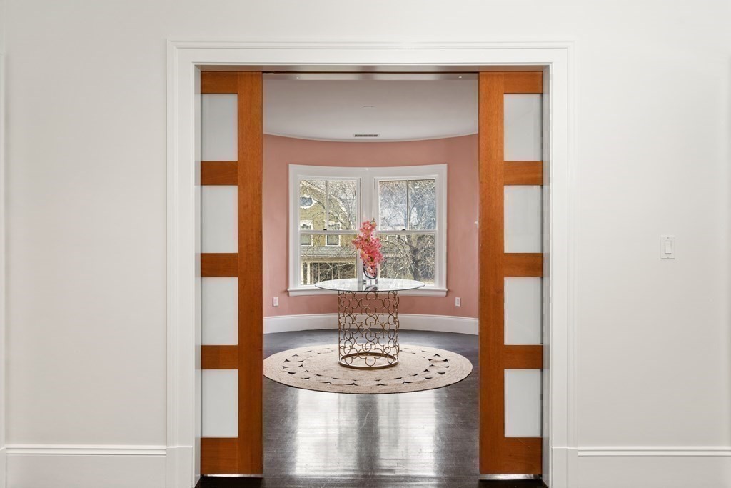 85 Prince Street Newton, MA 02465 - Photo 13 of 37 a dining room with furniture and a window