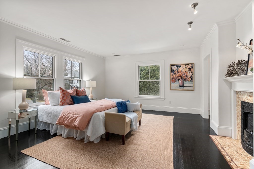 85 Prince Street Newton, MA 02465 - Photo 14 of 37 a bedroom with a bed and a couch