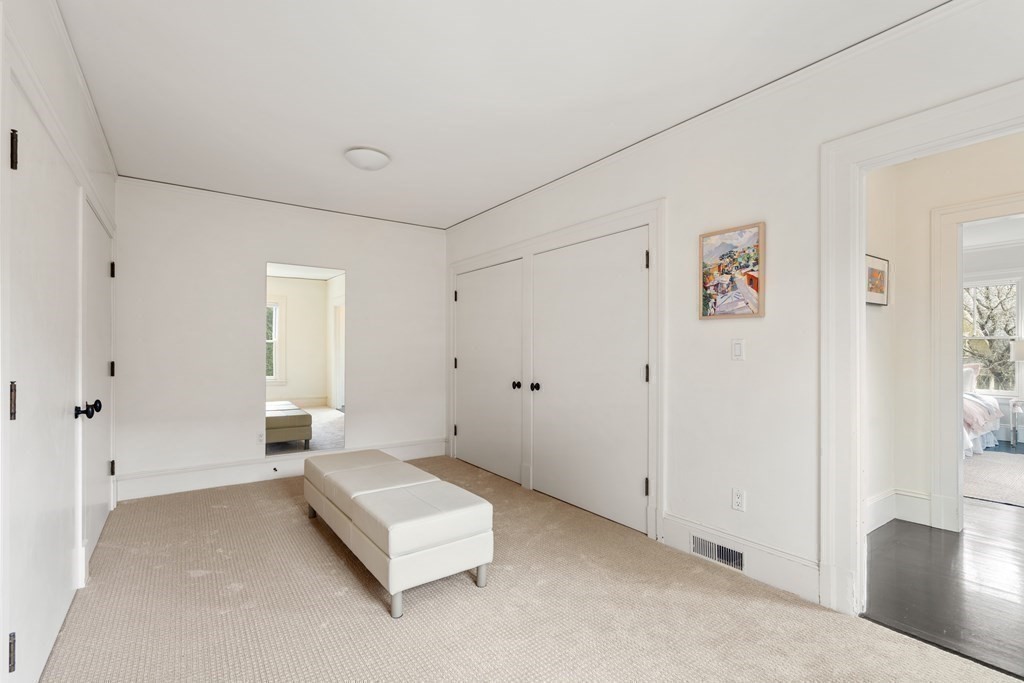 85 Prince Street Newton, MA 02465 - Photo 16 of 37 a living room with furniture and a table