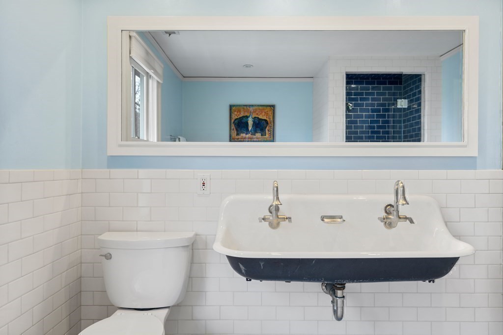 85 Prince Street Newton, MA 02465 - Photo 22 of 37 a bathroom with a sink and a toilet