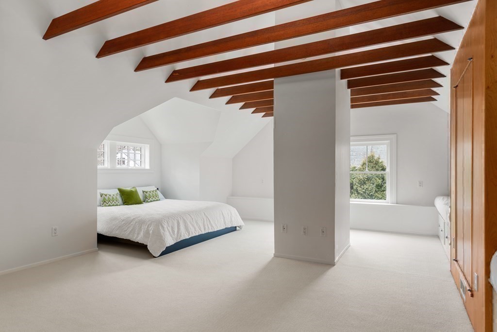 85 Prince Street Newton, MA 02465 - Photo 25 of 37 a bedroom with a bed and a window