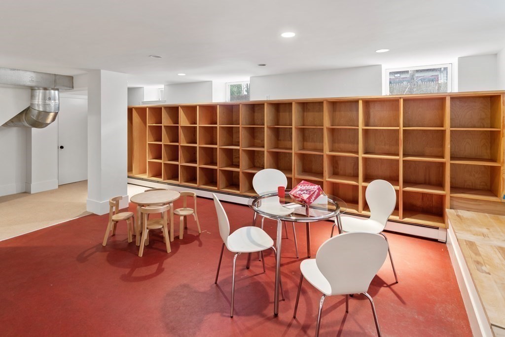 85 Prince Street Newton, MA 02465 - Photo 28 of 37 a dining room with furniture and wooden floor
