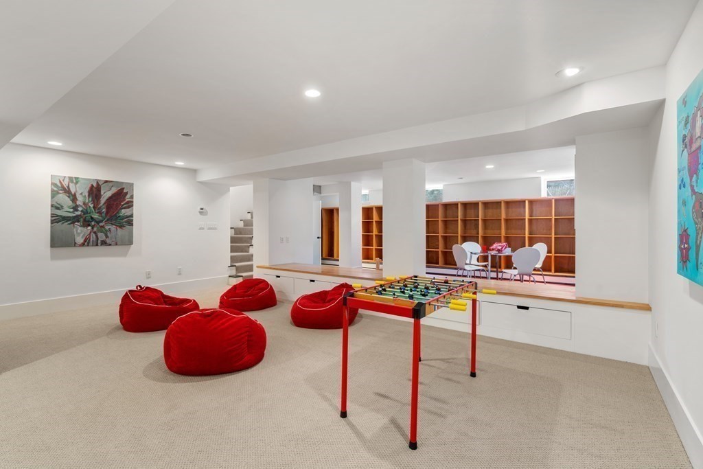 85 Prince Street Newton, MA 02465 - Photo 29 of 37 a kitchen with stainless steel appliances kitchen island granite countertop a sink and cabinets