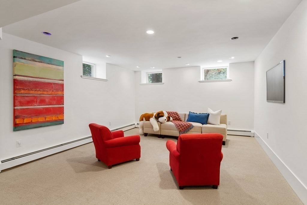 85 Prince Street Newton, MA 02465 - Photo 30 of 37 a living room with furniture and a window