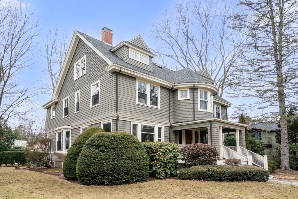 85 Prince Street Newton, MA 02465 - Photo 32 of 37 a front view of a house with a garden