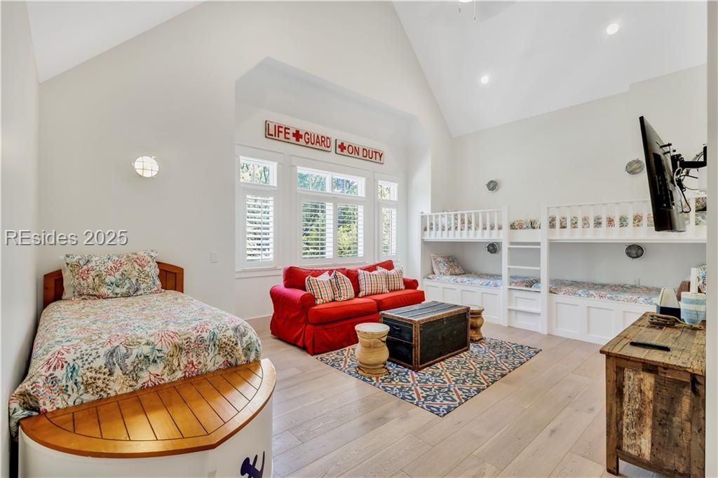 15 Grey Widgeon Road Hilton Head Island, SC 29928 - Photo 31 of 65 Large bunk room with sleeper sofa, TV and adjoinin