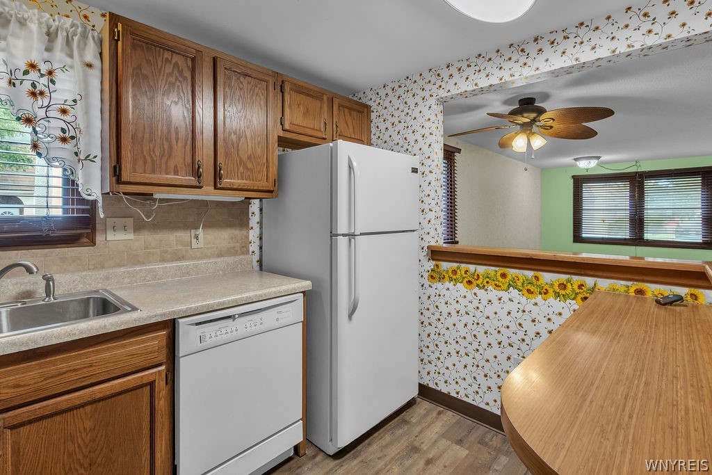 4755 Chestnut Ridge Road, Unit 9 Amherst, NY 14228 - Photo 20 of 46 Kitchen to dinette area and living room