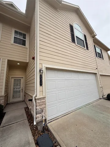 a view of a house with a garage