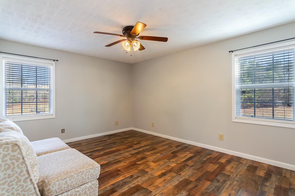 65 Ivy Ridge Ellijay, GA 30536 - Photo 13 of 28 a bedroom with a bed and a window