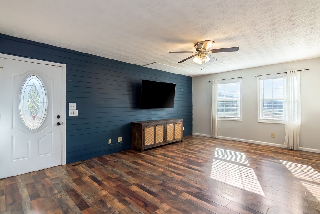 65 Ivy Ridge Ellijay, GA 30536 - Photo 5 of 28 a bedroom with furniture window and a ceiling fan