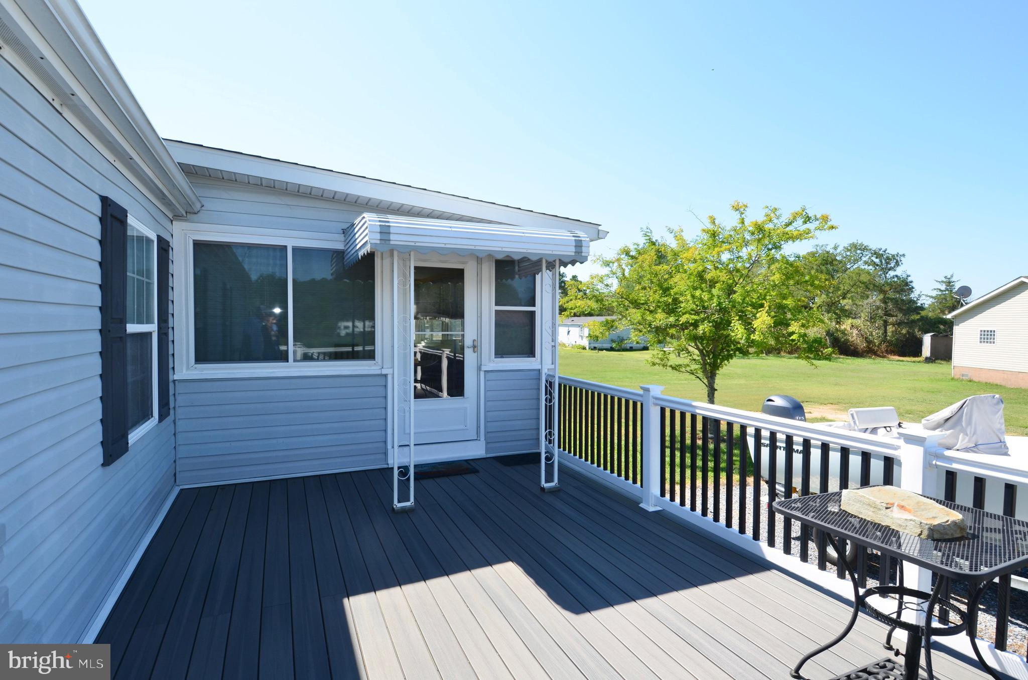 9980 Champ Road Princess Anne, MD 21853 - Photo 17 of 26 Back Porch with entrance to Sun Room