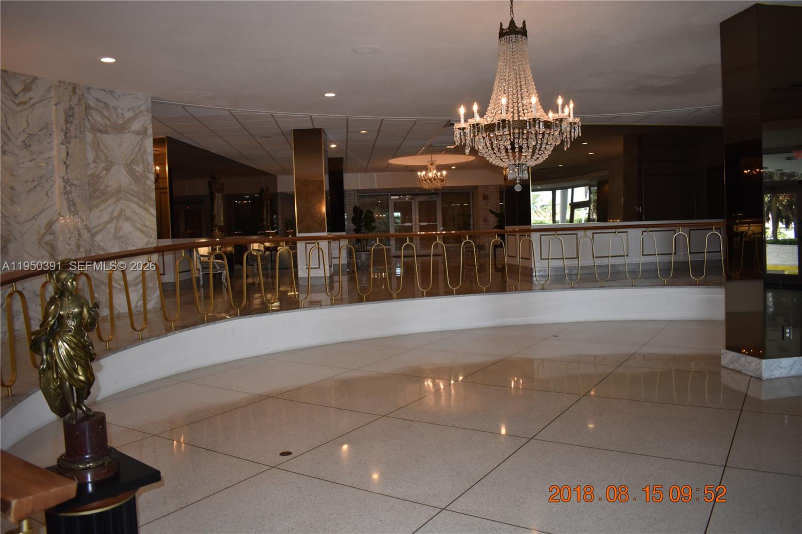 5255 Collins Avenue, Unit 4F Miami Beach, FL 33140 - Photo 16 of 20 a view of a lobby with furniture