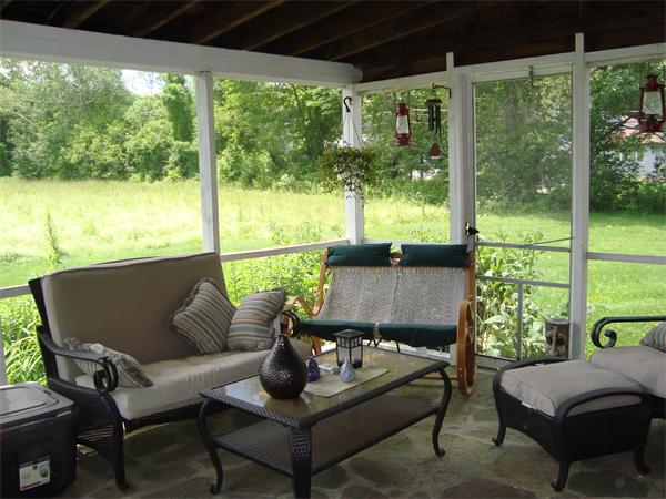 53 Putnam Hill Road Sutton, MA 01590 - Photo 8 of 15 a outdoor living space with furniture and garden view