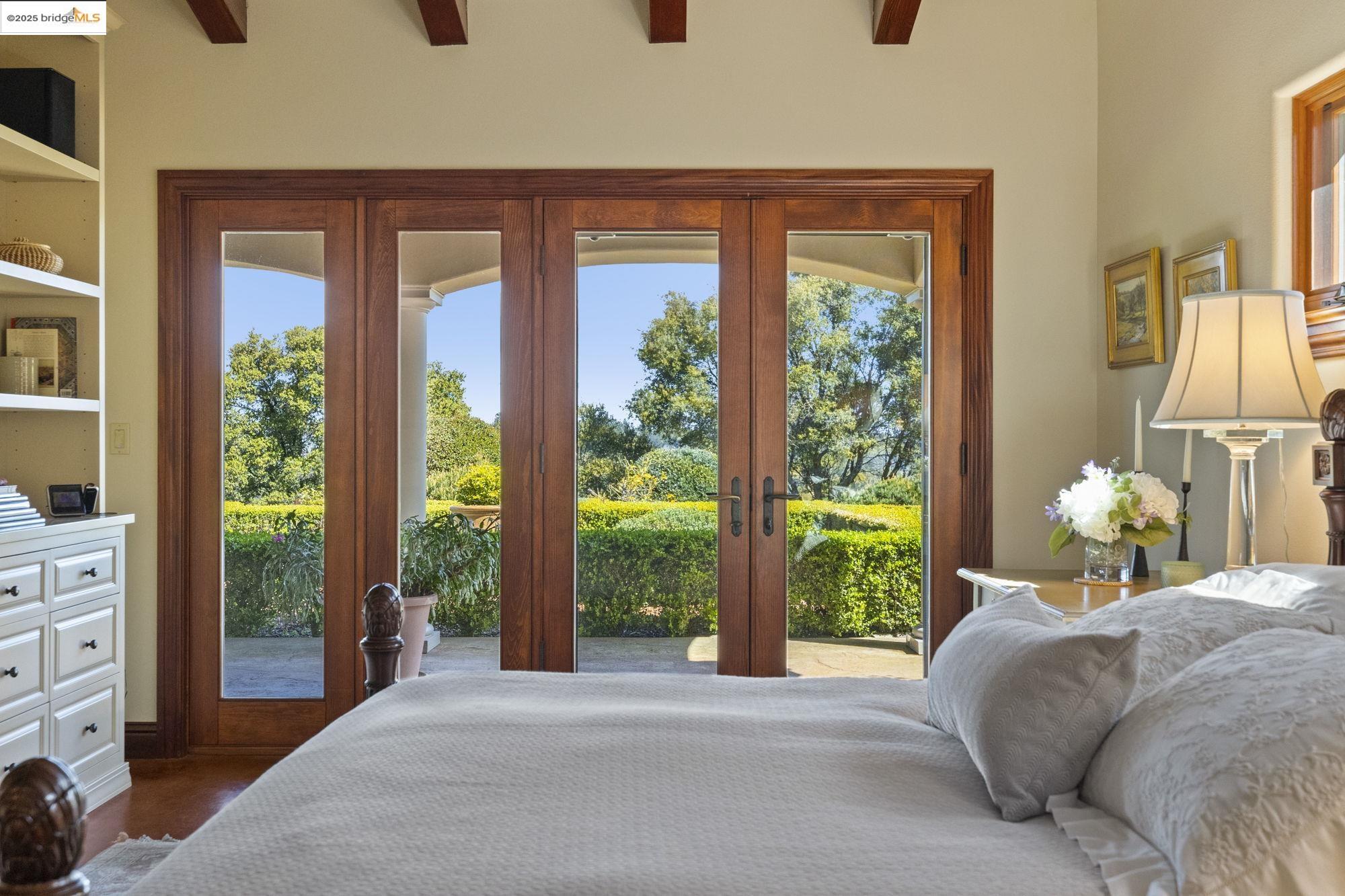 10270 Slate Rim Road Sonora, CA 95370 - Photo 26 of 55 a bedroom with a bed and a large window