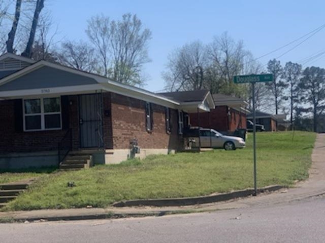 802 Pendleton Street Memphis, TN 38114 - Photo 6 of 22 front view of a house with a yard