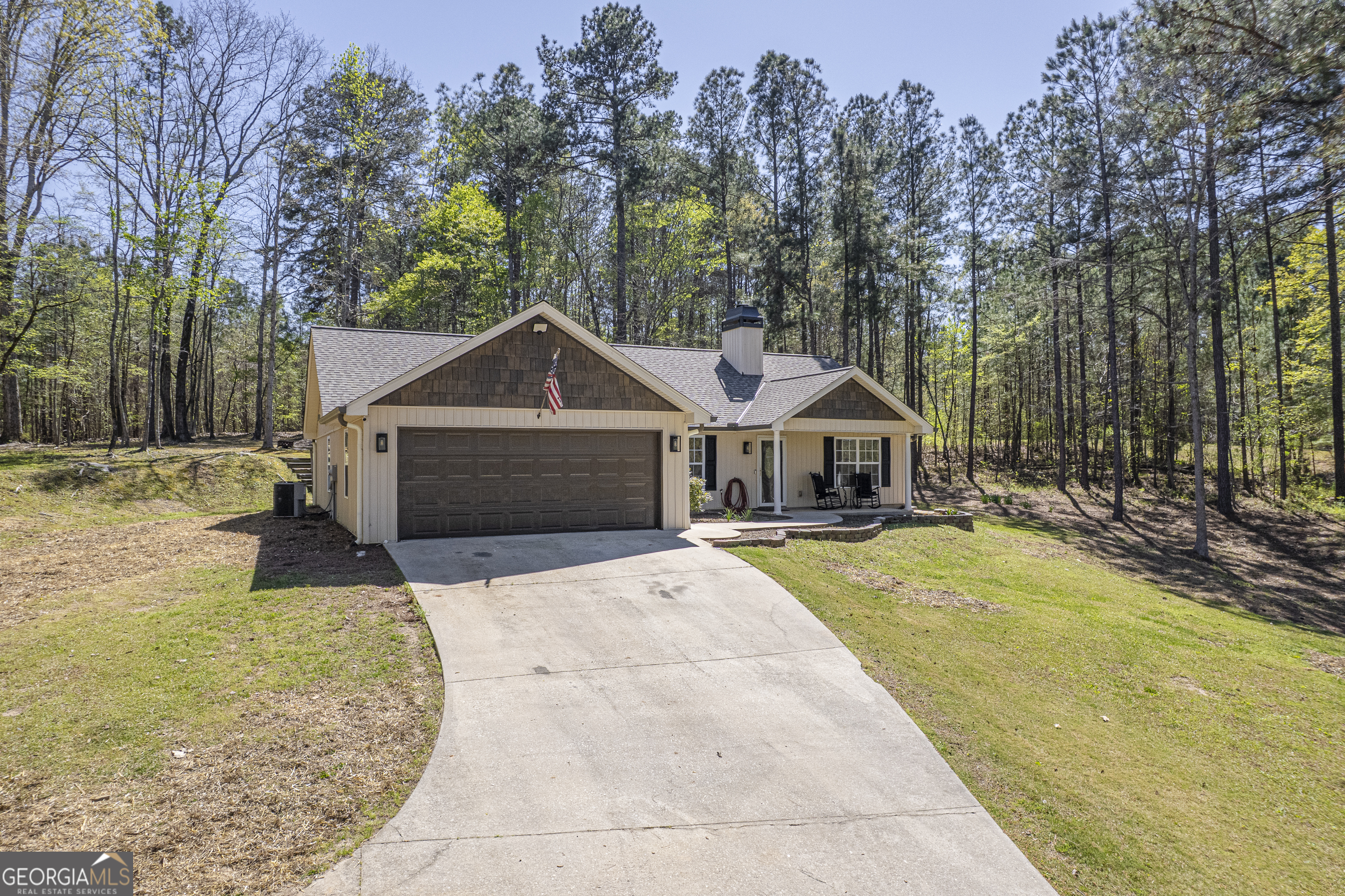 176 Arrowhead Trail Eatonton, GA 31024 - Photo 3 of 45 a front view of a house with a yard