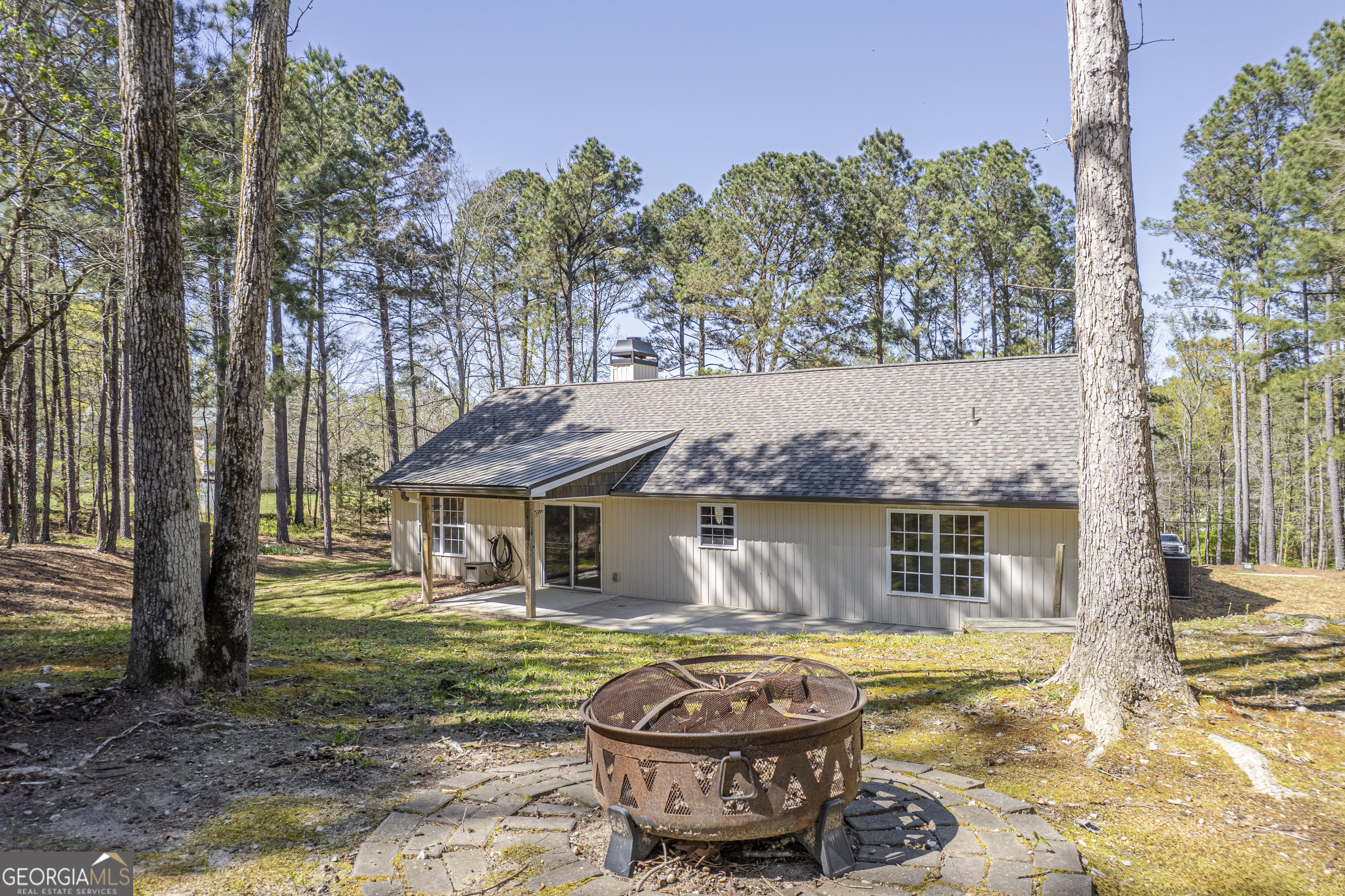 176 Arrowhead Trail Eatonton, GA 31024 - Photo 33 of 45 a house with swimming pool in front of it
