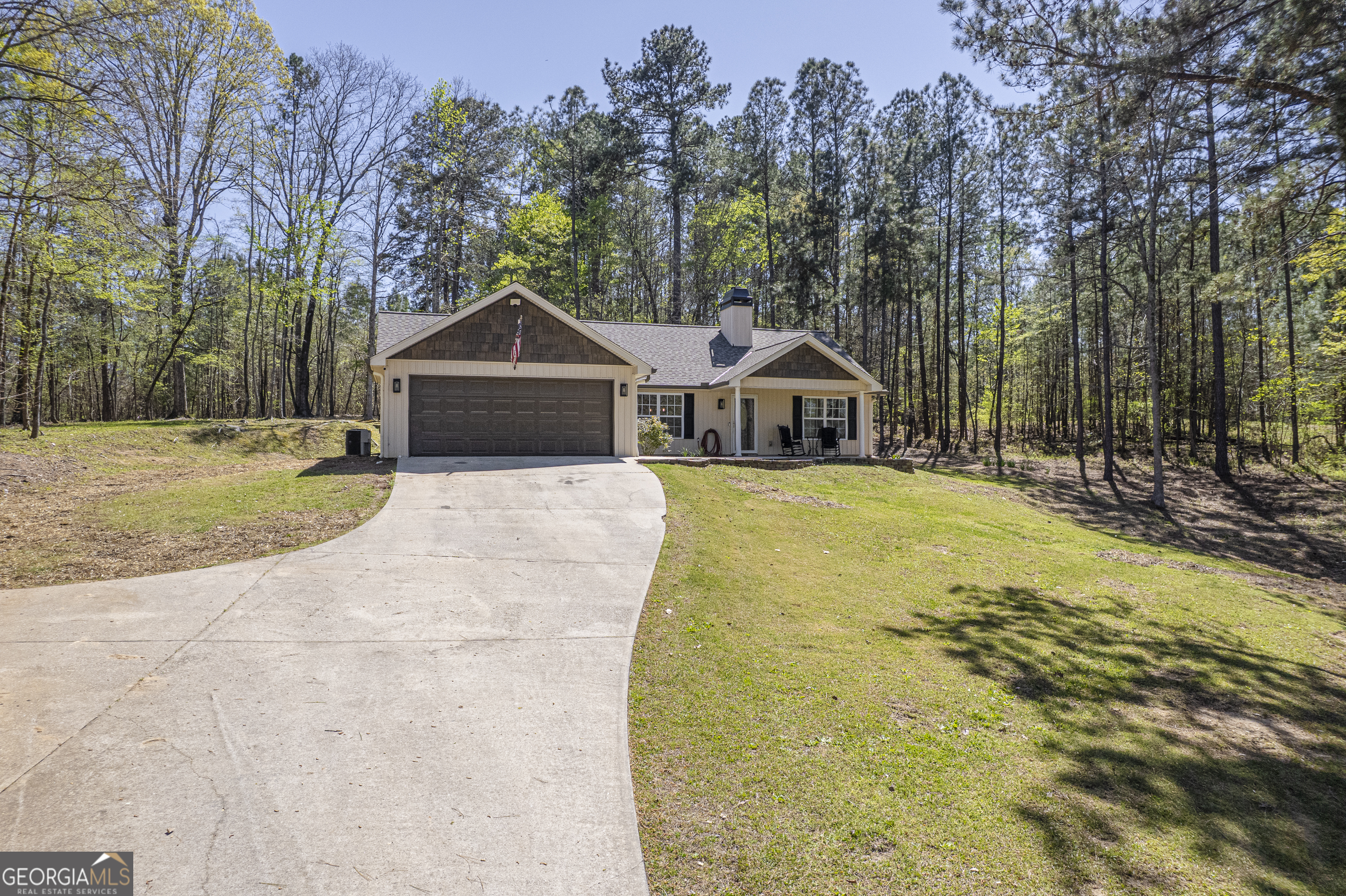 176 Arrowhead Trail Eatonton, GA 31024 - Photo 4 of 45 a front view of a house with a yard