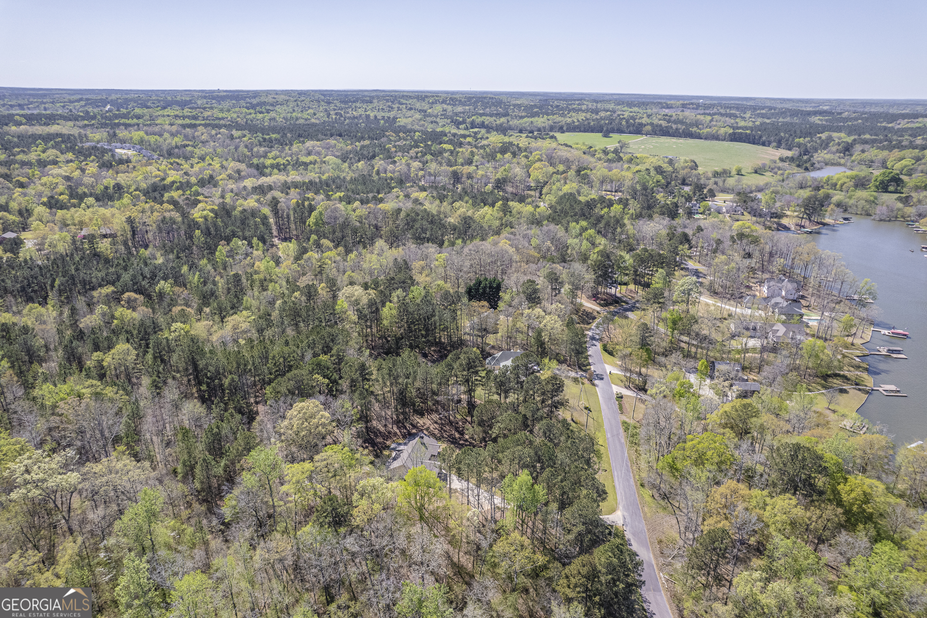 176 Arrowhead Trail Eatonton, GA 31024 - Photo 43 of 45 an aerial view of residential houses with outdoor space