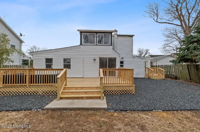 a view of a backyard of the house