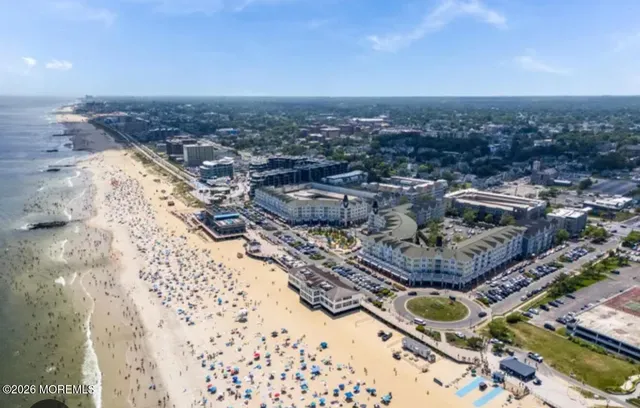 a view of a swimming pool with a sitting space