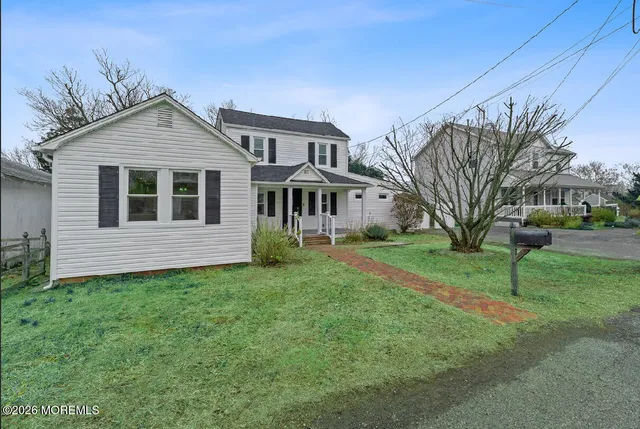 a view of a yard in front of a house