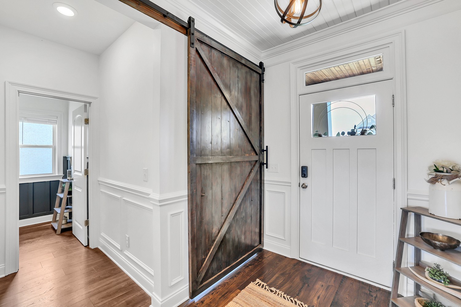 1142 Batbriar Road Murfreesboro, TN 37128 - Photo 12 of 60 a view of a hallway with wooden floor and entryway