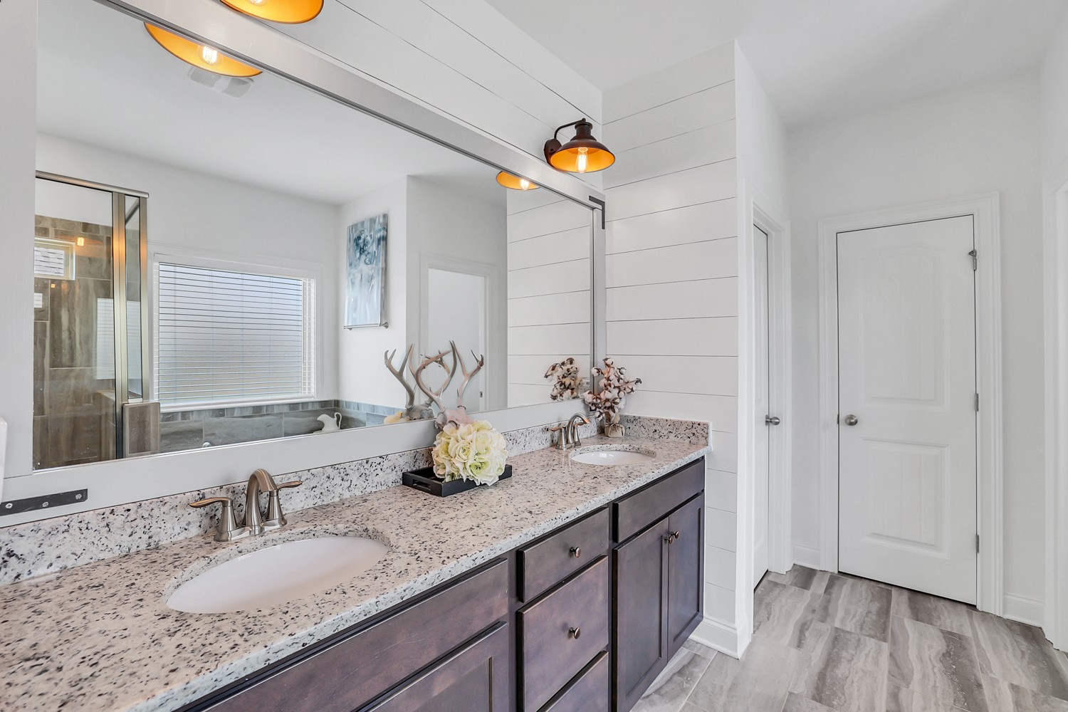 1142 Batbriar Road Murfreesboro, TN 37128 - Photo 28 of 60 a bathroom with a granite countertop sink and a mirror