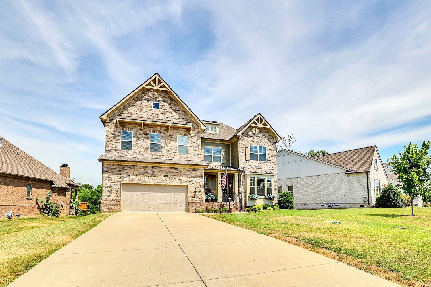 1142 Batbriar Road Murfreesboro, TN 37128 - Photo 4 of 60 a front view of a house with a yard