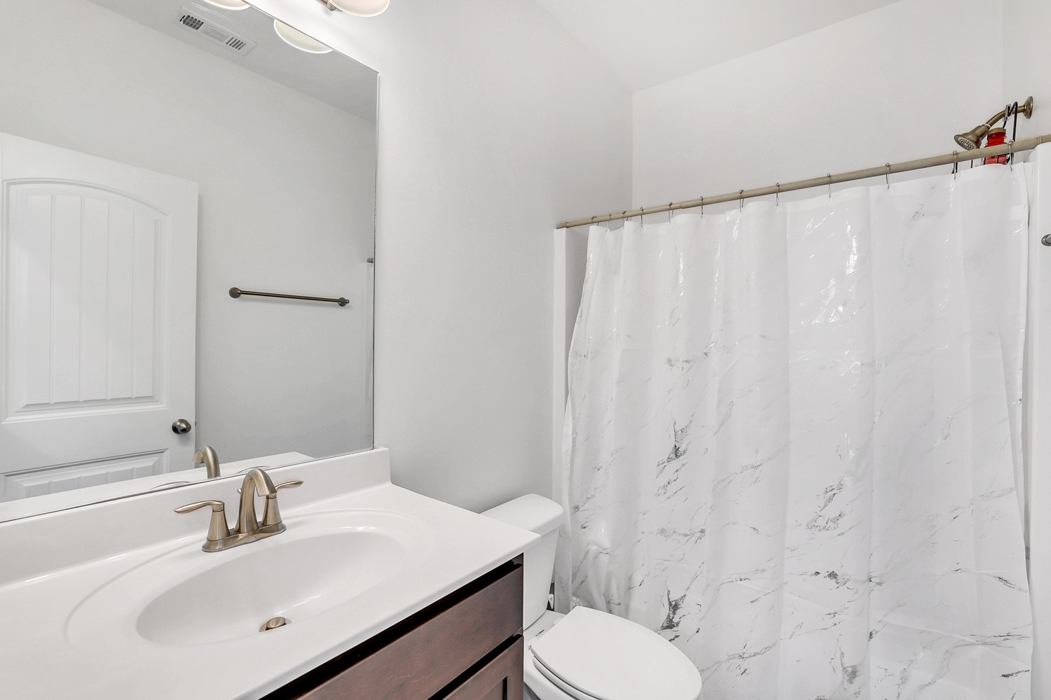 1142 Batbriar Road Murfreesboro, TN 37128 - Photo 42 of 60 a bathroom with a sink toilet and shower