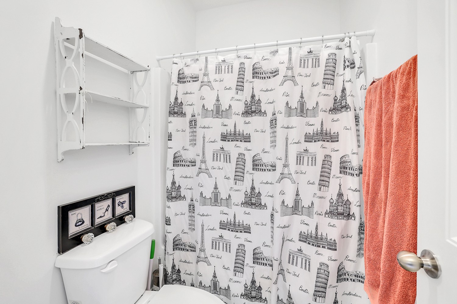 1142 Batbriar Road Murfreesboro, TN 37128 - Photo 47 of 60 a white toilet sitting next to a shower curtain