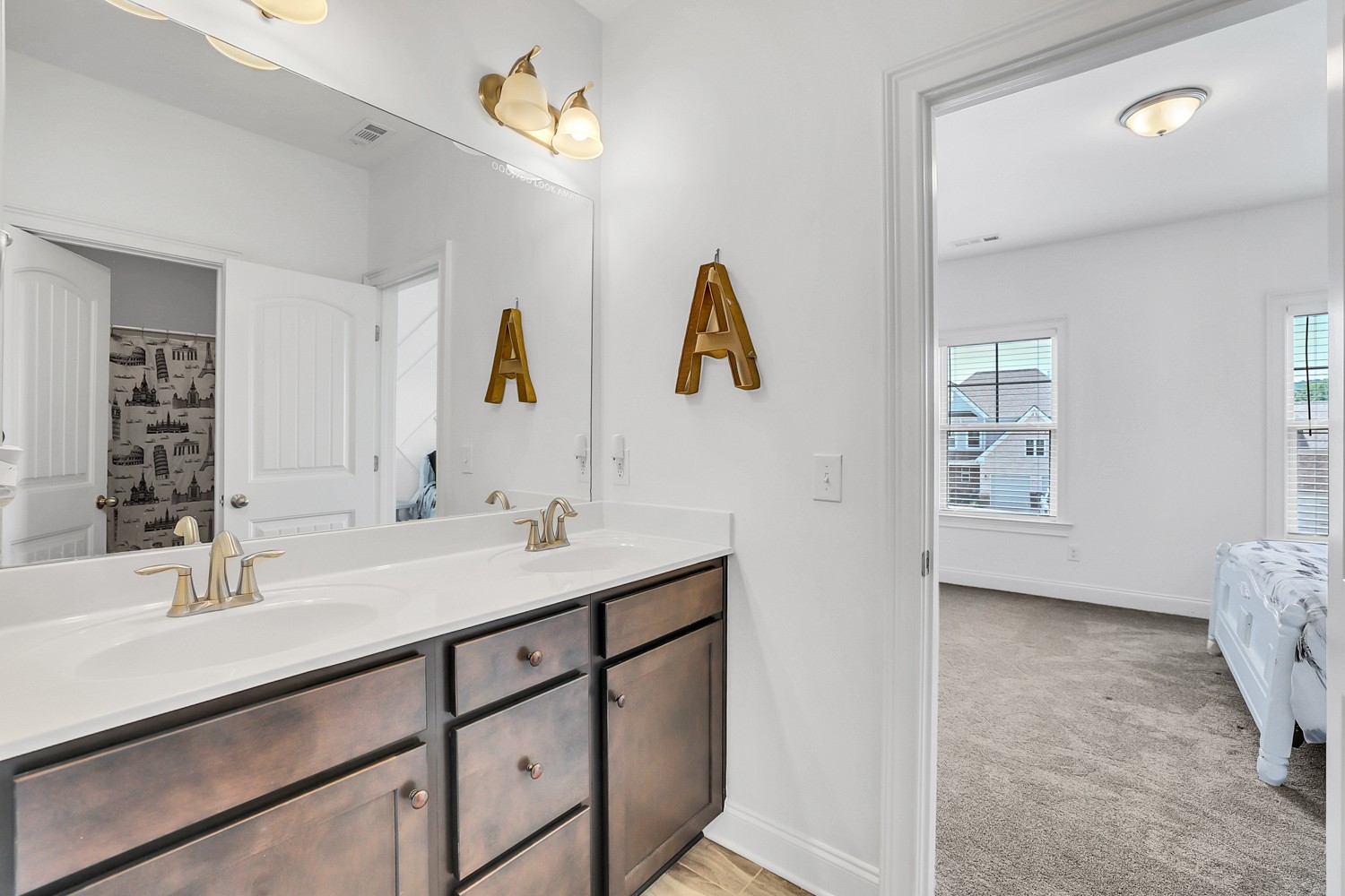 1142 Batbriar Road Murfreesboro, TN 37128 - Photo 48 of 60 a bathroom with a sink vanity and mirror