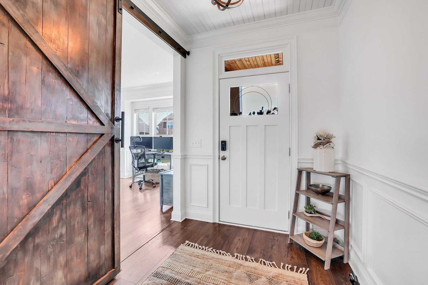 1142 Batbriar Road Murfreesboro, TN 37128 - Photo 7 of 60 a view of a hallway with wooden floor and staircase